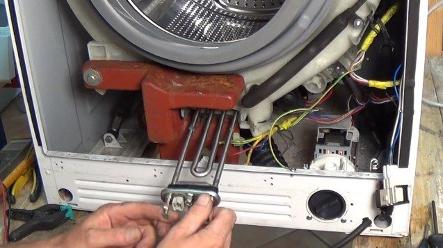 Menggantikan pemanas di mesin basuh